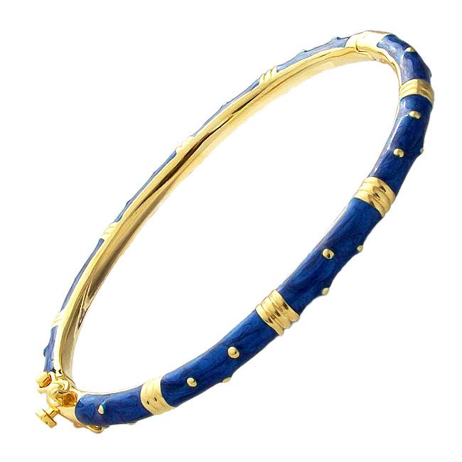 The zirconmania Bracelet Thin Gold tone Enamel Bangle 501B5339 features deep blue enamel segments with gold dots and bands, evoking bamboo-inspired elegance.
