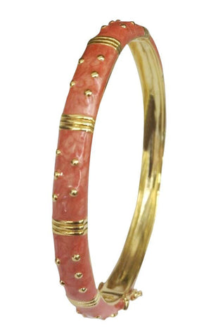 The zirconmania Bracelet Hinged Enamel Bangle 501B41902 showcases pink enamel segments divided by gold bands with gold studs, and features an easy-to-use hinged clasp for secure wear.