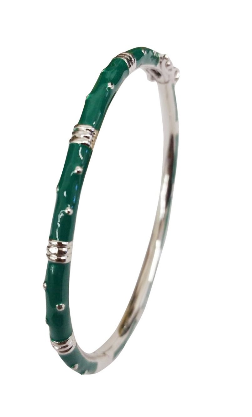 The zirconmania Bracelet Thin Gold tone Enamel Bangle 501B5339 features a gold and silver tone with green enamel, showcasing a bamboo-inspired design and silver accents wrapped around the bangle.