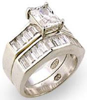 The zirconmania Ring Cubic Zirconia Sterling Silver Set 501R20225 features a striking square-cut center stone with rectangular cubic zirconia accents set along the sterling silver band.