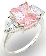 The zirconmania Ring Cubic Zirconia Sterling Silver 501R34101 features a large rectangular pink center stone with two smaller clear stones—an elegant CTR CZ ring with timeless style.