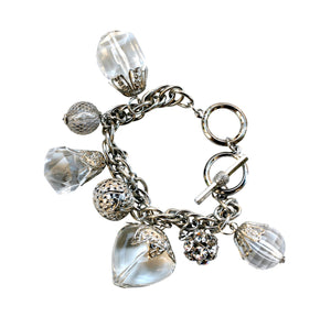 Interlocking oval link charm bracelet with dangling large size faceted stone shapes