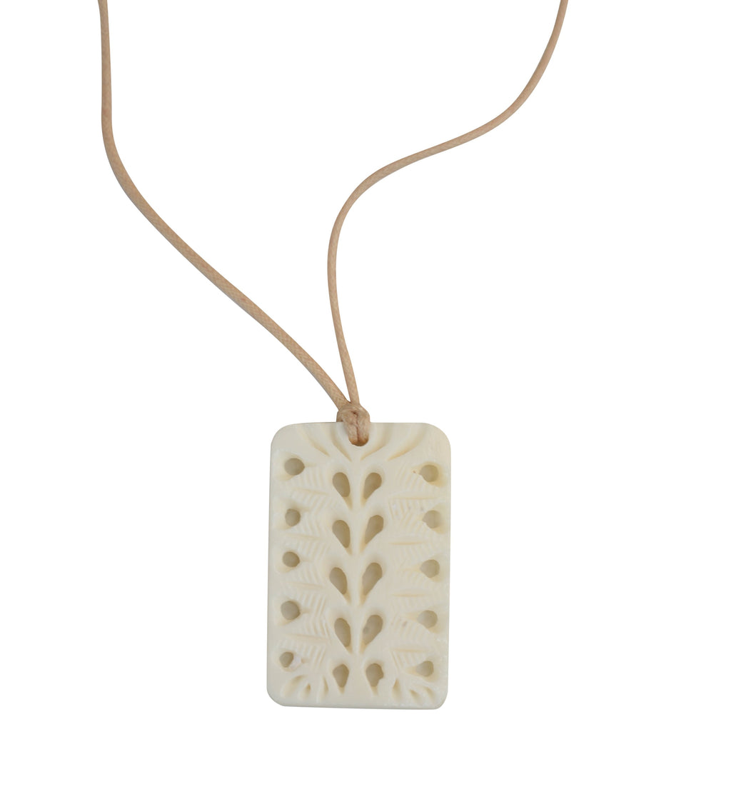 Rectangle white bone pendant with artisan filigree two sided design