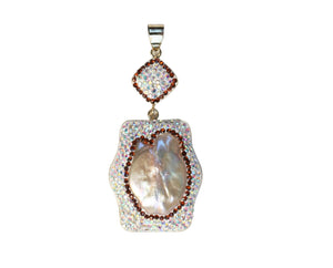 Pendant baroque pearl black rope. 543P101
