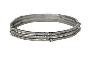 The zirconmania Bracelet Three Designer Bangles 622B0166x3 features three stacked designer bangles with textured surfaces and small round crystal accents, showcased on a white background.