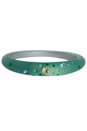 The zirconmania Bracelet Jeweled frosted slender bangle 629B364 features a matte green finish and is adorned with small blue and yellow gemstones scattered around the band.