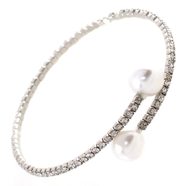 The zirconmania Bracelet Genuine Czech open pearl ends one row Bangle (629B82255) is a silver elastic bangle with sparkling Czech crystals and two large white pearl ends on an open design.