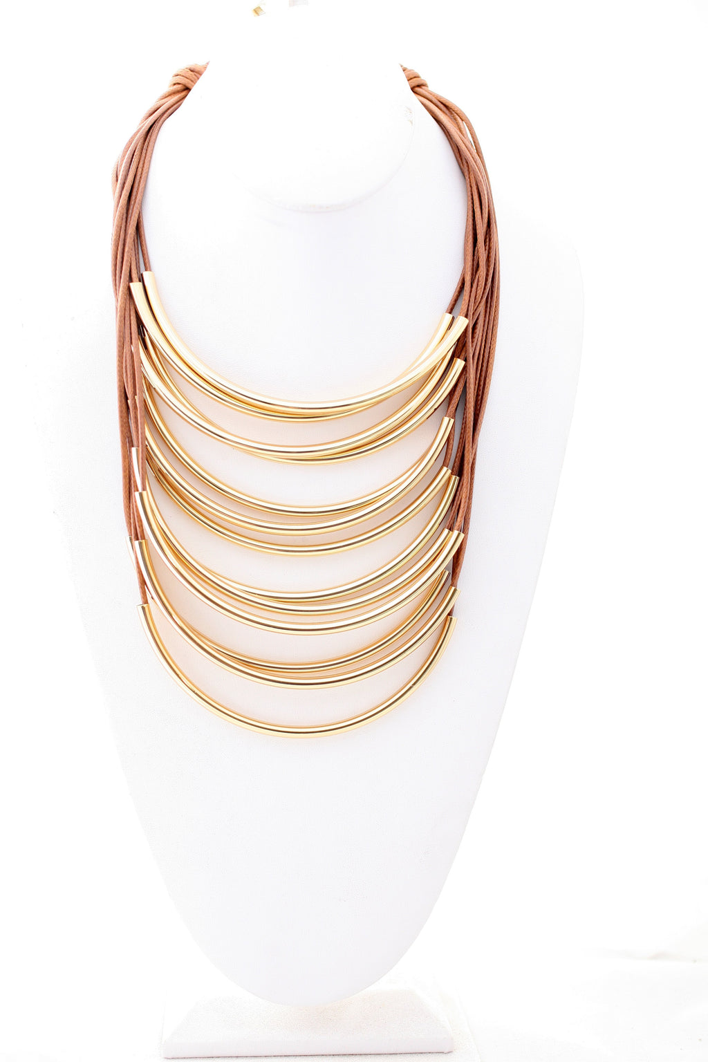 Multi strand leather cord and metal tubes draped statement necklace. 702N6214