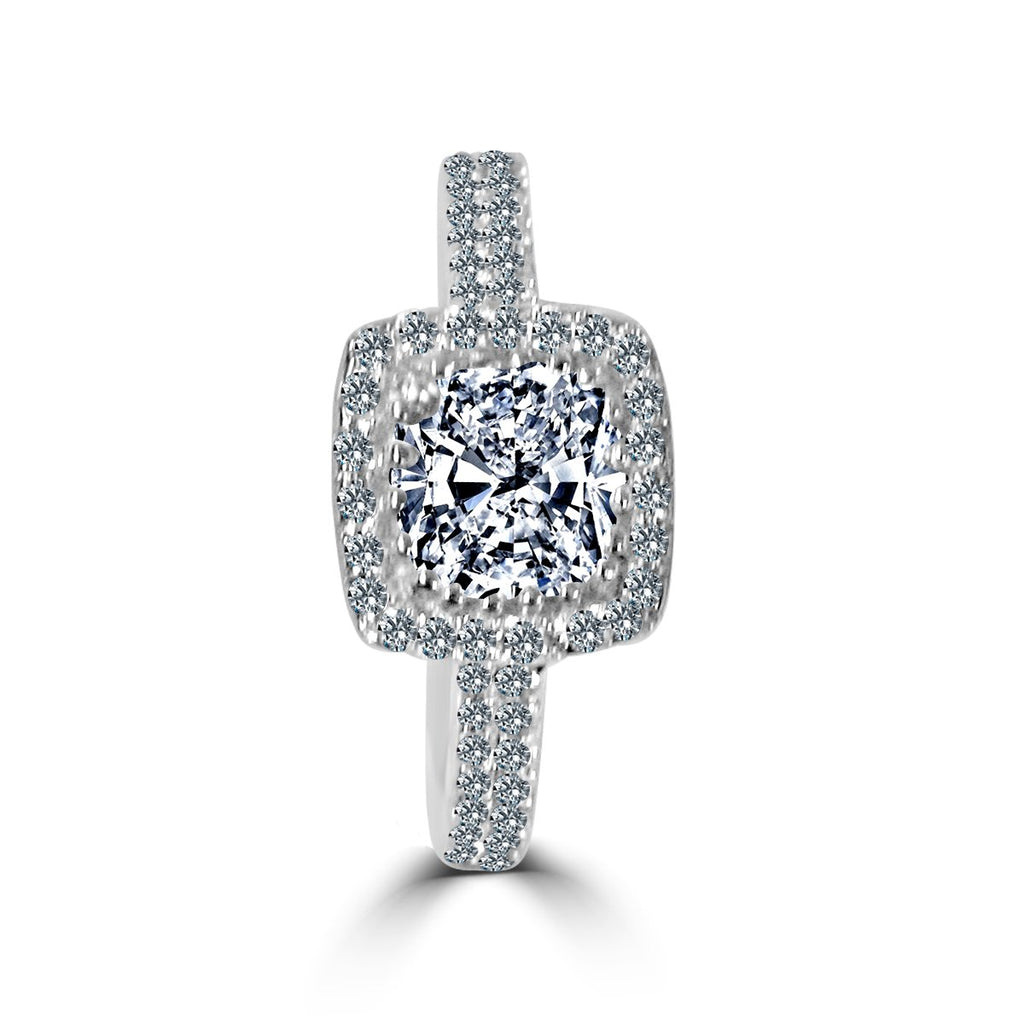 The zirconmania Ring 1CT Cushion Radiant Center w/Halo features a cushion-cut CZ center, halo pave accents, and a sterling silver band for classic elegance.