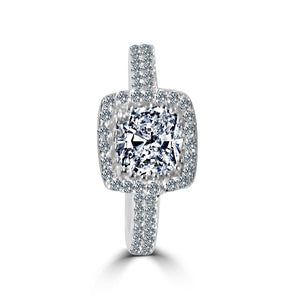 The zirconmania Ring 1CT Cushion Radiant Center w/Halo features a cushion-cut CZ center, halo pave accents, and a sterling silver band for classic elegance.