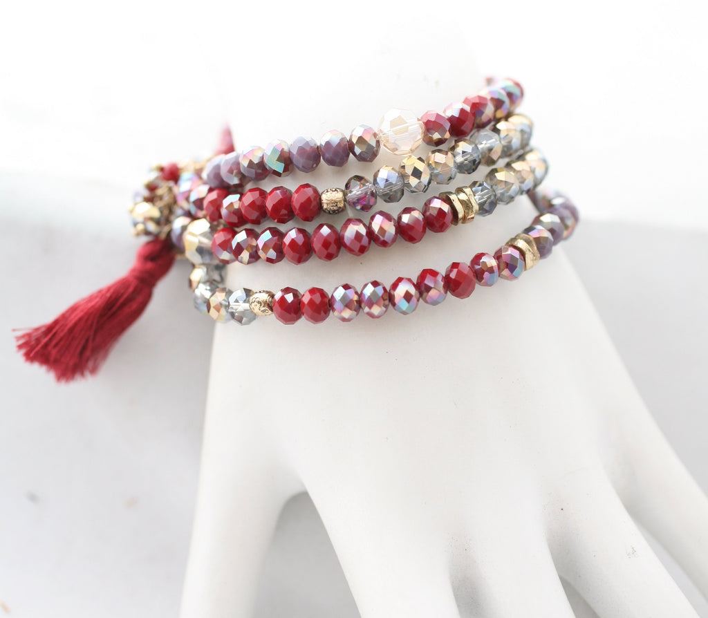 faceted Glass beads Rundles finished with a string tassel 661B385