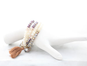 faceted Glass beads Rundles finished with a string tassel 661B385