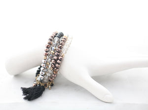 faceted Glass beads Rundles finished with a string tassel 661B385