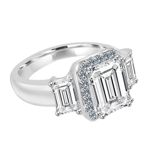 Ring 9X7 Em Cut Ctr Cz 6X4 Em Side Cz's