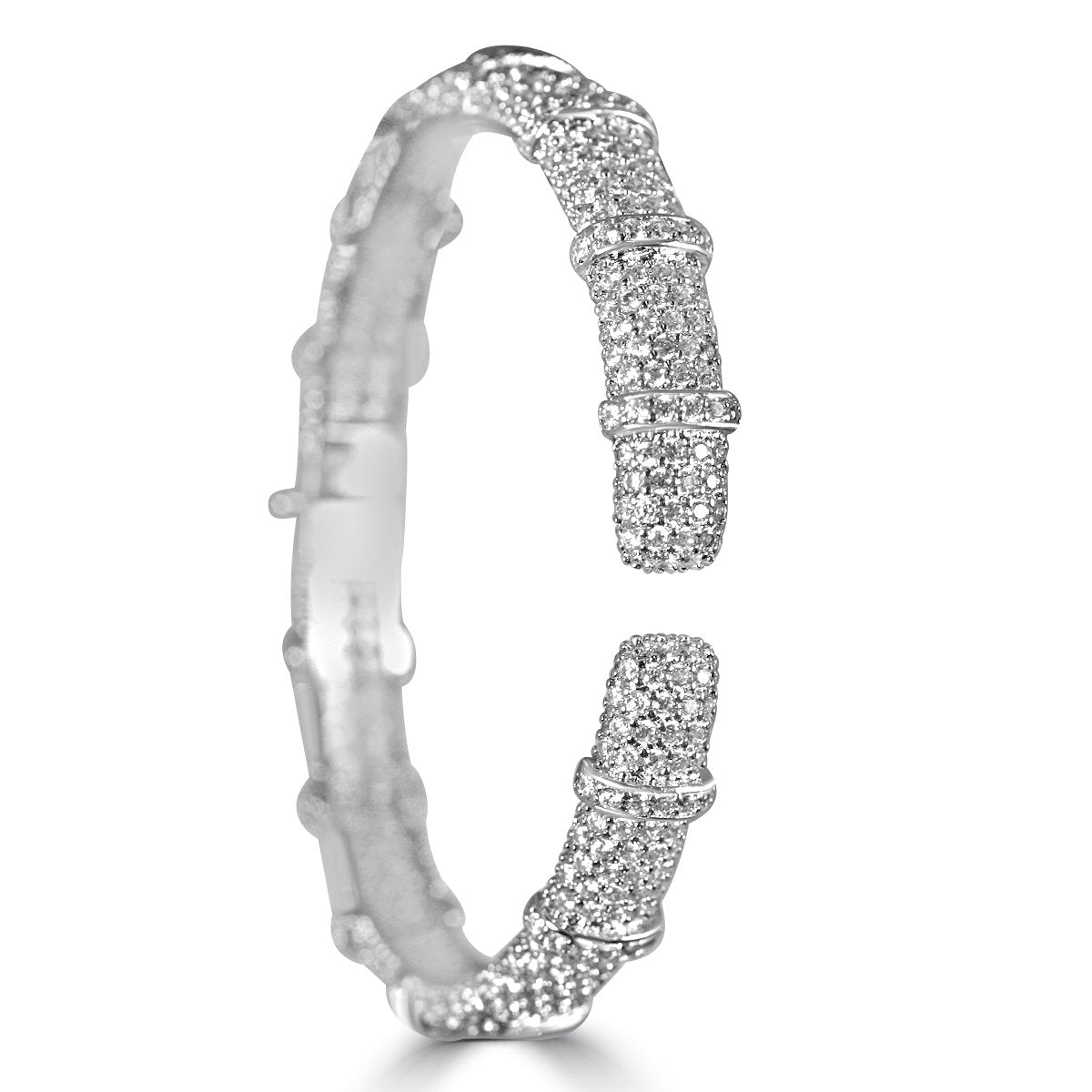 The zirconmania Bracelet Face-off line Stations wide fine Cubic Zirconia Set Hinged Bangle 698B100 features multiple rows of round, white cubic zirconia and sleek silver bands, pictured on a white background.