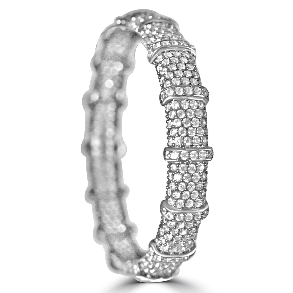 The zirconmania Bracelet Face-off line Stations is a wide, fine hinged bangle set with sparkling cubic zirconia rows and raised bands that form a segmented design around its entire circumference.