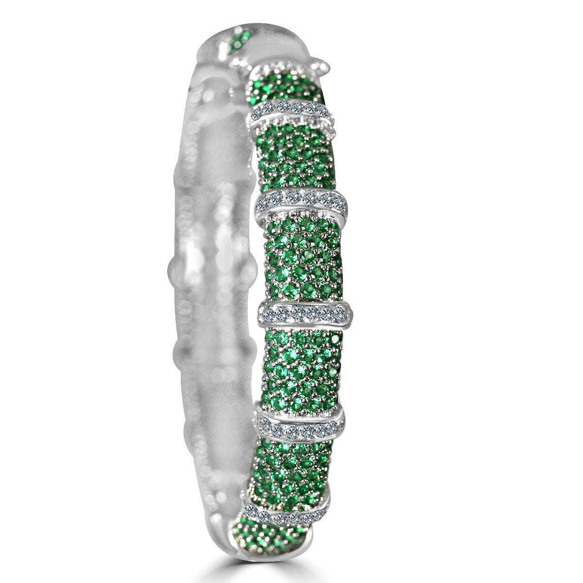 The zirconmania Bracelet Face-off Line Stations Wide Fine Cubic Zirconia Set Hinged Bangle (698B100) features clusters of green gemstones and rows of clear stones, creating a segmented, dazzling design.