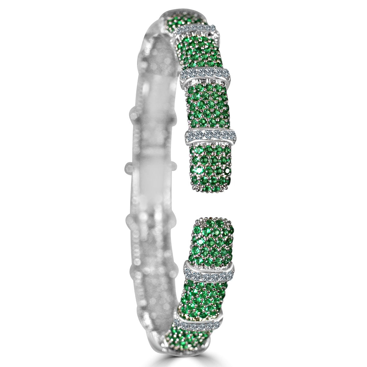 The zirconmania Bracelet Face-off line Stations wide fine Cubic Zirconia Set Hinged Bangle 698B100 is a silver bangle adorned with clusters of green gems and sparkling white cubic zirconia segments for a shimmering look.