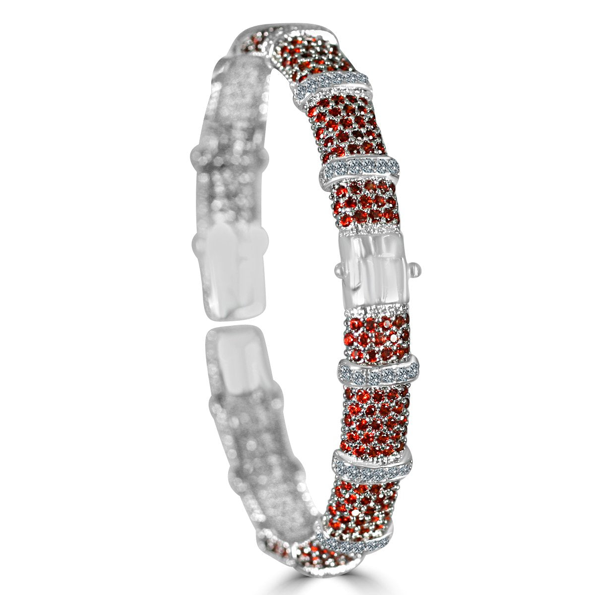 The zirconmania Bracelet Face-off line Stations wide fine Cubic Zirconia Set Hinged Bangle 698B100 features a textured, sparkling silver design with alternating rows of red and clear cubic zirconia and a central clasp.