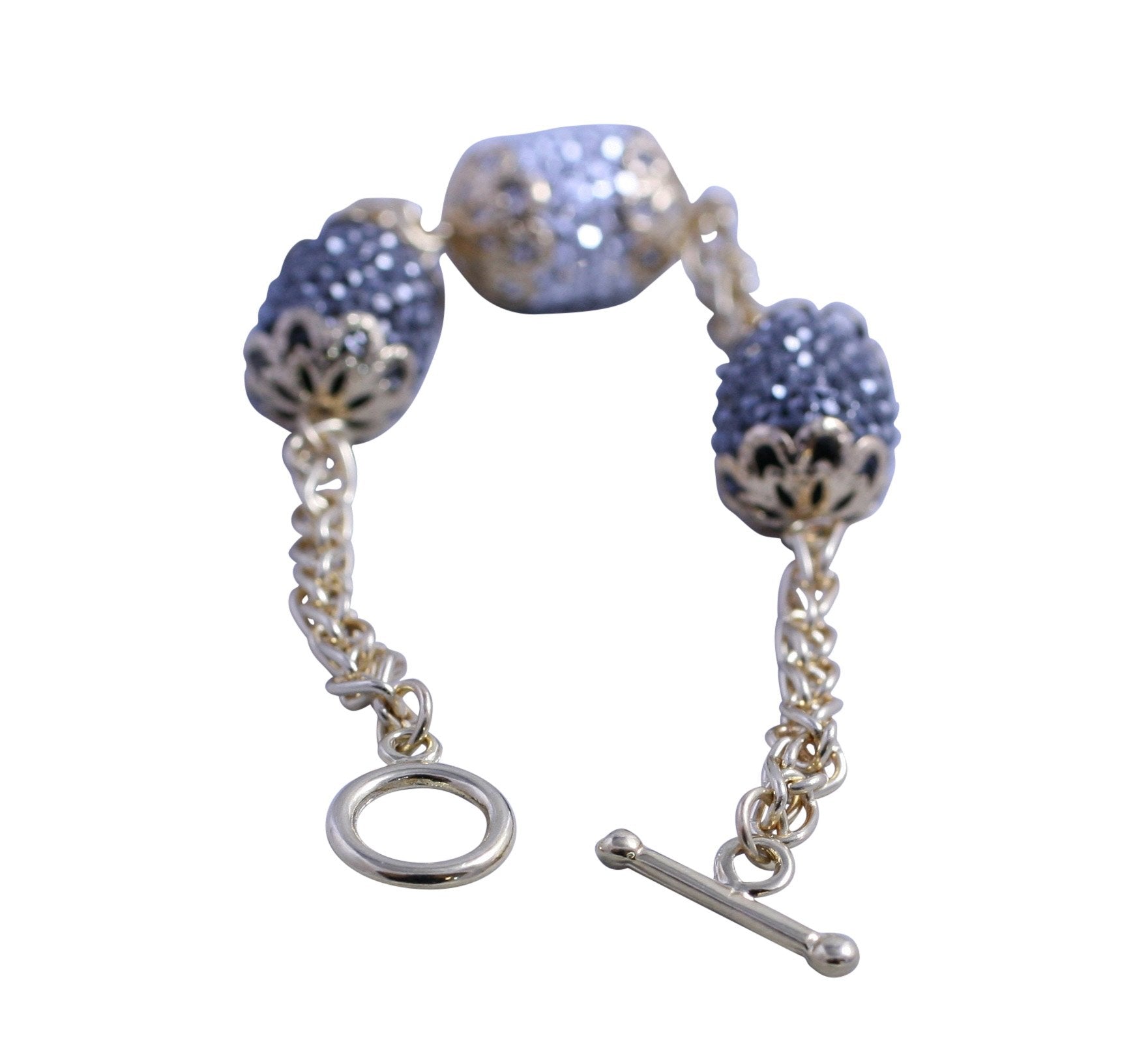 Gold chain toggle bracelet with black diamond and clear crystal studded barrel shape stations 661B1001