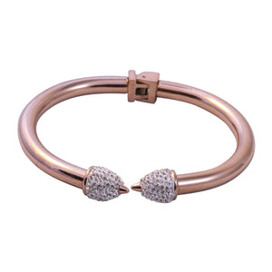 The zirconmania Bracelet Rose Gold Classic Stainless Steel Rounded Profile Bangle 655B1109RG features two acorn-shaped ends with sparkling white stones and a secure hinge clasp at the back.